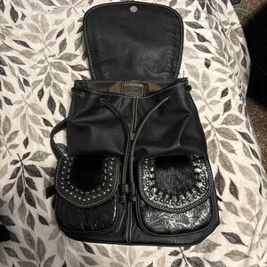Black leather Trinity Ranch backpack